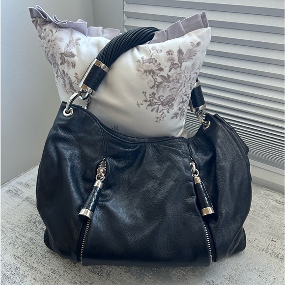 Michael Kors black handbag.